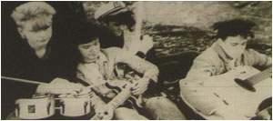 Caption: Love On Boatrd…at the end of the road. From left: John Twist, Neil Jones, Nick Reed and Glenn ‘hi-de-hi’ Lewis.