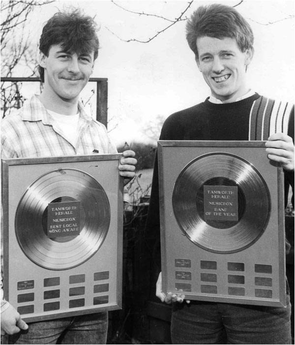 Lloyd Barnett (left) and Mark Mortimer at Lloyd's Mom's back garden