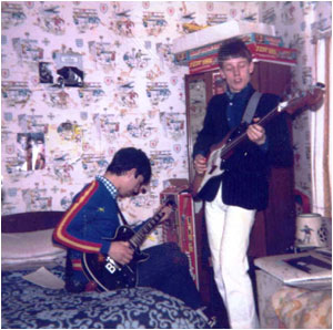 Brian Lacey (left) and Mark Mortimer pretending to jam (!!!) in Mark Mortimer’s bedroom at his parents' house in Gillway in March 1982.